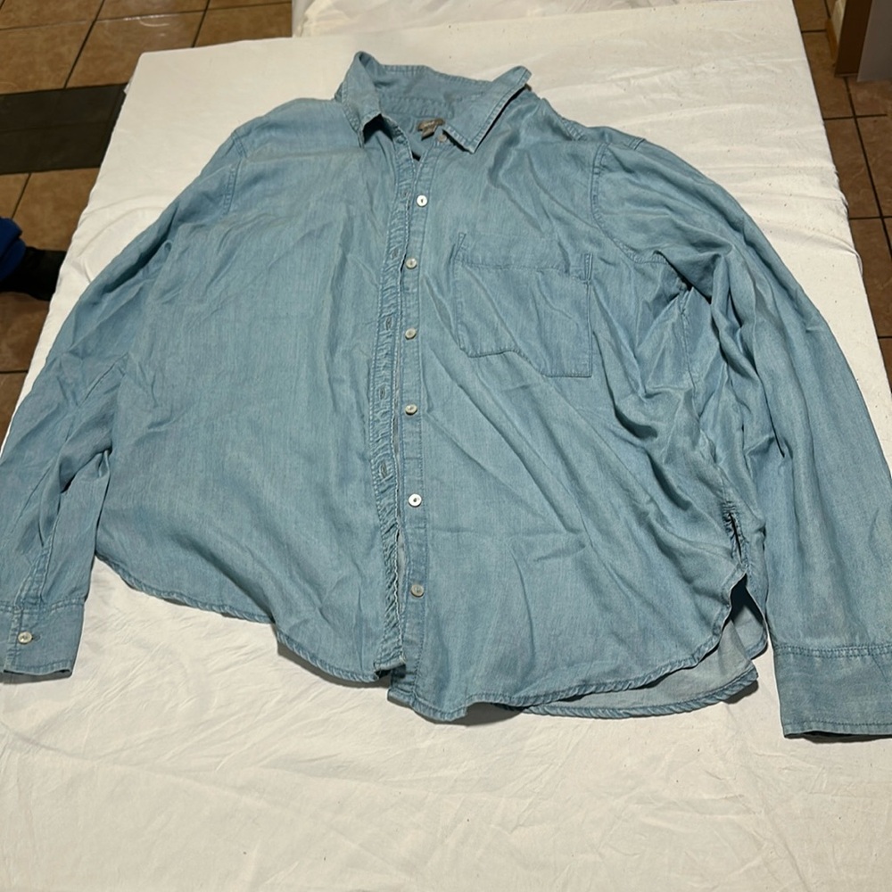 American Eagle Aerie Soft Blue Long Sleeve Jean Shirt with a front pocket.
